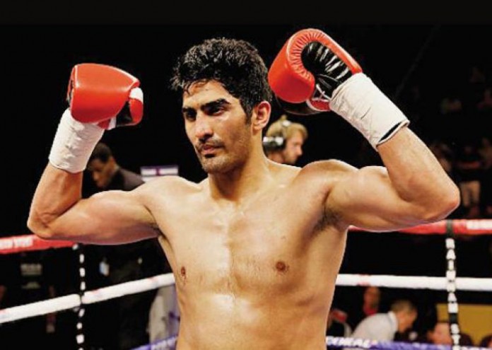 Vijender Singh clinches fourth successive professional win Vijender Singh clinches fourth successive professional win