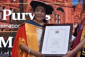 Asha bhosle with an honorary doctorate