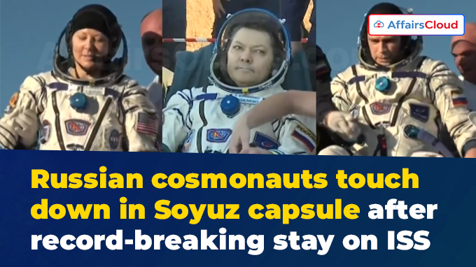 Russian cosmonauts touch down in Soyuz capsule after record-breaking stay on ISS